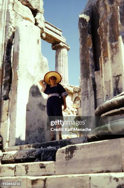 the seventies. a young woman at the temple of apollo. didyma, turkey. - 1974 stock pictures, royalty-free photos & images