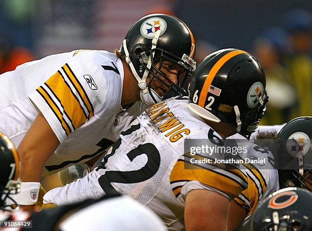 Ben Roethlisberger of the Pittsburgh Steelers gives instructions to center Justin Hartwig against the Chicago Bears on September 20, 2009 at Soldier...