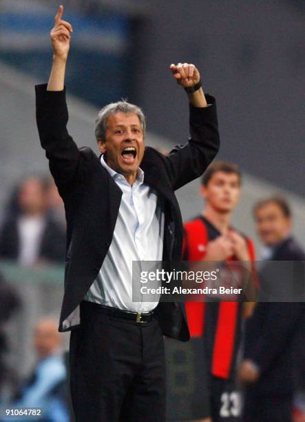 Head coach Lucien Favre of Berlin shouts during the DFB Cup second round match between TSV 1860 Muenchen and Hertha BSC Berlin at Allianz Arena on...