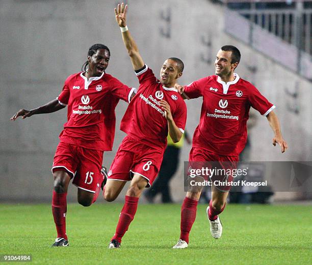 Sidney Sam of Kaiserslautern celebrates scoring his team's first goal with team mates Georges Mandjeck and Adam Nemec during the DFB Cup second round...