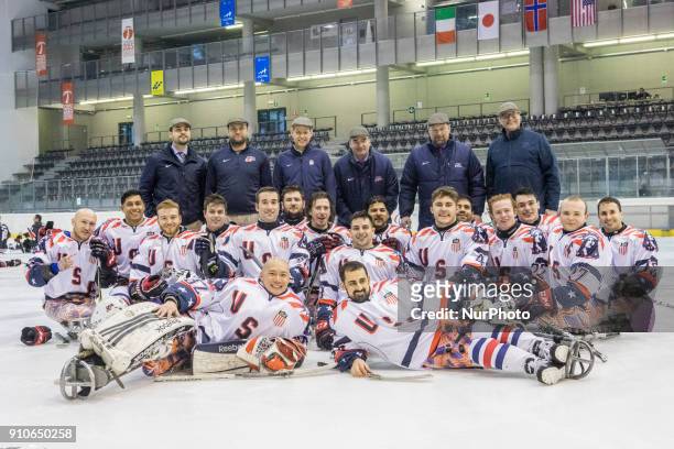 National team of Para Ice Hockey pose after International Para Ice Hockey Tournament of Torino Semifinal match between USA and Japan in Turin, italy,...