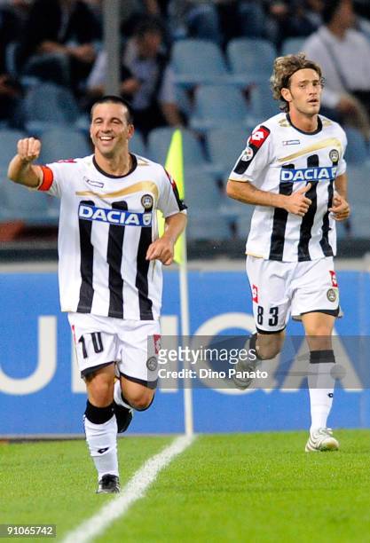 Antonio Di Natale of Udinese Calcio celebrates after scores the first goal during the serie A match between Udinese Calcio and AC Milan at Stadio...