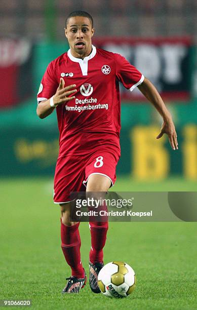 Sidney Sam of Kaiserslautern runs with the ball during the DFB Cup second round match between 1. FC Kaiserslautern and Bayer Leverkusen at...