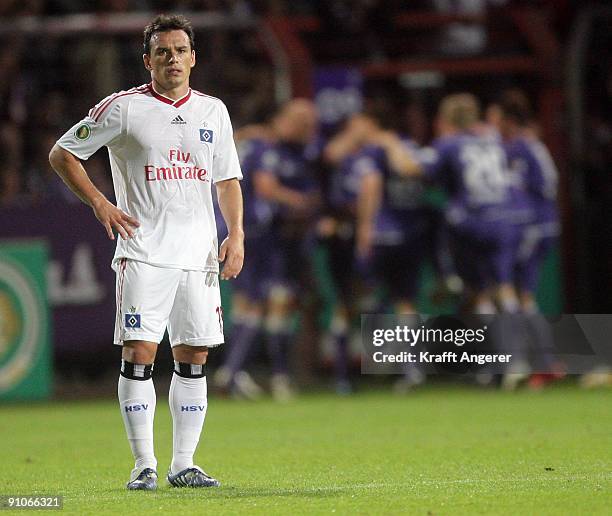 PiotrTrochowski of Hamburg looks dejected after the second goal for Osnabrueck during the DFB Cup second round match between VfL Osnabrueck and...