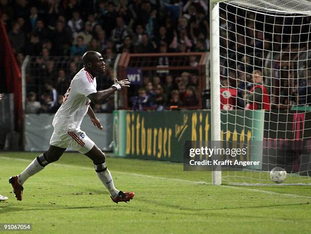 Guy Demel of Hamburg scores the third goal for Hamburg during the DFB Cup second round match between VfL Osnabrueck and Hamburg SV at Osnatel Arena...