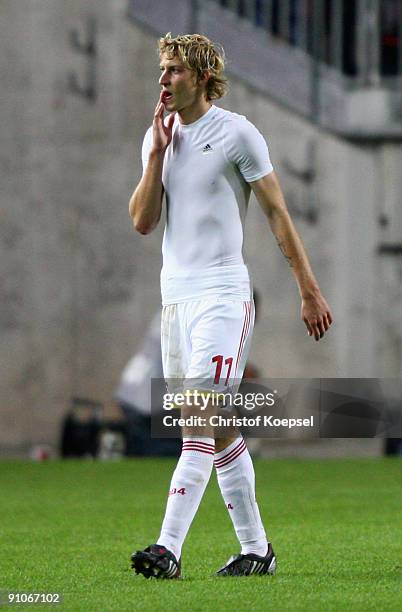 Stefan Kiessling of Leverkusen looks dejected after losing 1-2 the DFB Cup second round match between 1. FC Kaiserslautern and Bayer Leverkusen at...