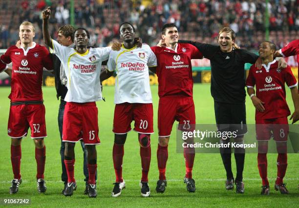 Adam Nemec, George Mandjeck, Rodnei, Florian Dick, Tobias Sippel and Sidney Sam of Kaiserslautern celebrate the 2-1 victory after the DFB Cup second...