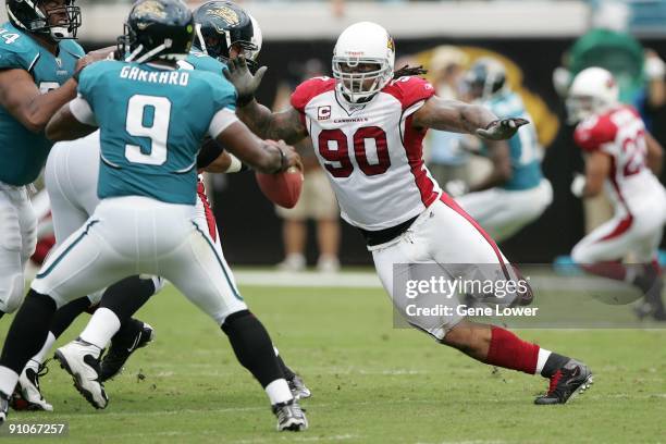 Arizona Cardinals defensive tackle Darnell Dockett in pursuit during a game against the Jacksonville Jaguars at Jacksonville Municipal Stadium on...