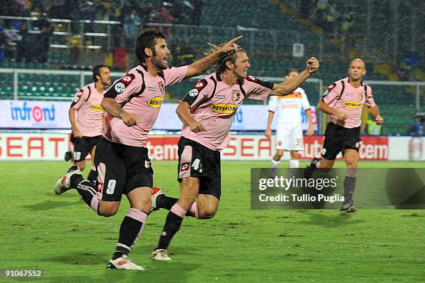 Antonio Nocerino of Palermo and his team-mates celebrtate their third goal during the Serie A match played between US Citta di Palermo and AS Roma at...