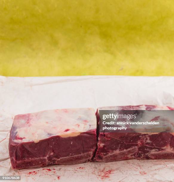 beef chuck on package material. - schmorbraten stock-fotos und bilder