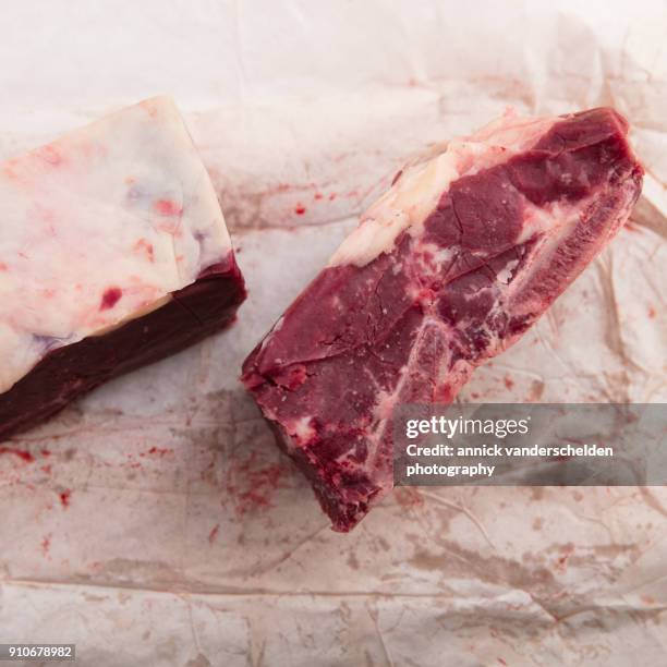 beef chuck on package material. - schmorbraten stock-fotos und bilder