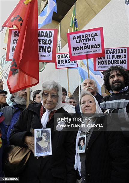 Mirta Baravalle and Nora Cortinas, from theMadres de Plaza de Mayo organization, stand outside the Brazilian Embassy in Buenos Aires, on September 23...