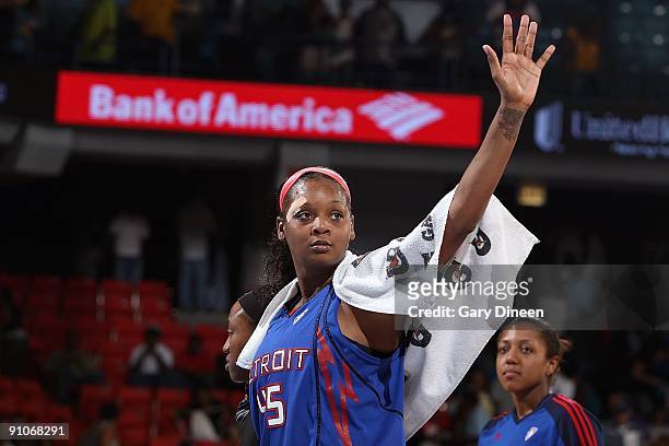 Kara Braxton of the Detroit Shock waves to the audience during the WNBA game against the Chicago Sky on September 12, 2009 at the UIC Pavilion in...