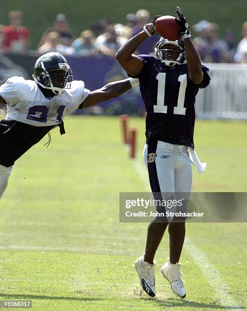 Patrick Johnson pulls in a catch during the Baltimore Ravens training camp at McDaniel College in Westminster, Maryland on August 2, 2005
