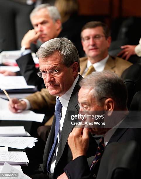 Sen. Jeff Bingaman , Sen. Kent Conrad , Committee Chairman Sen. Max Baucus , and Sen. Chuck Grassley listen during a mark up hearing before the U.S....