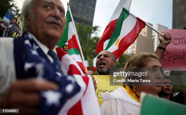 Protesters opposed to Iranian President Mahmoud Ahmadinejad demonstrate outside U.N. Headquarters on the first day of the United Nations General...