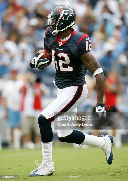 Jacoby Jones of the Houston Texans runs with the ball against the Tennessee Titans during the NFL game at LP Field on September 20, 2009 in...