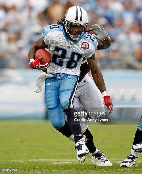 Chris Johnson of the Tennessee Titans runs with the ball during the NFL game against the Houston Texans at LP Field on September 20, 2009 in...