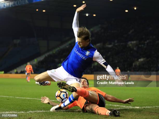 Glenn Loovens of Sheffield Wednesday and Yann Kermorgant of Reading during The Emirates FA Cup Fourth Round match between Sheffield Wednesday and...