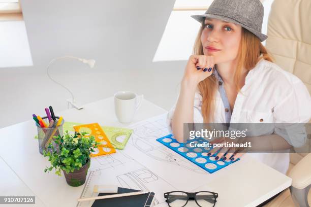 young designer in a sunny office - car design stock pictures, royalty-free photos & images