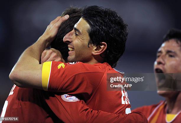 Chile's Union Espanola forward Raul Estevez celebrates with teammates after scoring against Argentina's Velez Sarsfield during a Copa Sudamericana...