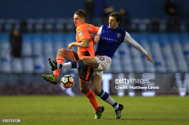 Liam Moore of Reading and Adam Reach of Sheffield Wednesday during The Emirates FA Cup Fourth Round match between Sheffield Wednesday and Reading on...