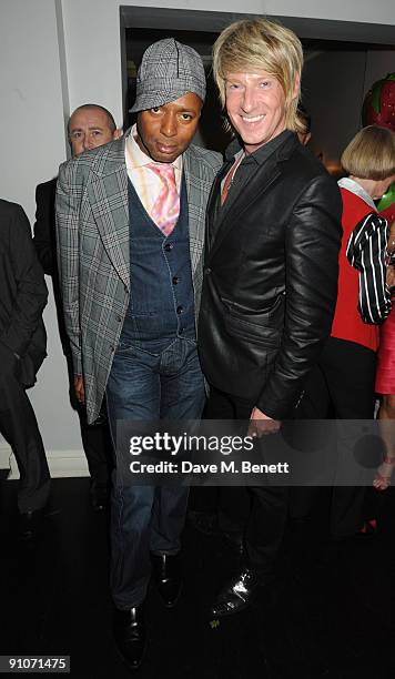 Lee John and Ian Carmichael attend the launch party of the Strawberry Health & Beauty treatment, at Kettner's on September 23, 2009 in London,...