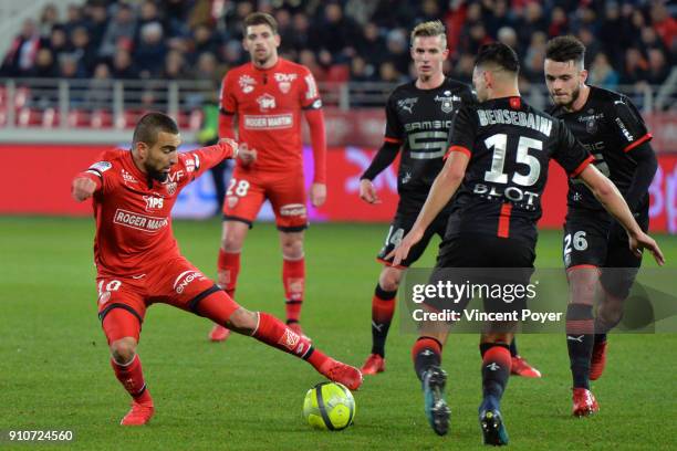 Naim SLITI of DFCO and Ramy BENSEBAINI of Rennes during the Ligue 1 match between Dijon FCO and Rennes at Stade Gaston Gerard on January 26, 2018 in...