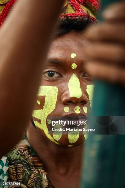 tribesman at festival - dinagyang festival stock pictures, royalty-free photos & images