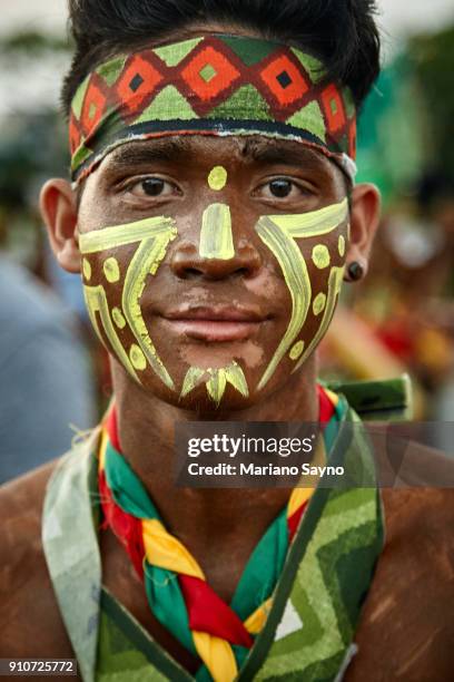 tribesman at festival - dinagyang festival stock pictures, royalty-free photos & images