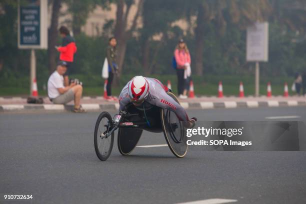 Hiroyuki Yamamoto of Japan is in action during the Standard Chartered Dubai Marathon for Wheel Chairs. He came second in a time of 1:27:18.