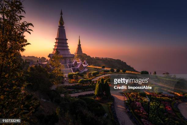 twin pagodas on the top of doi inthanon national park in chiang mai, thailand. - impossiable fotografías e imágenes de stock
