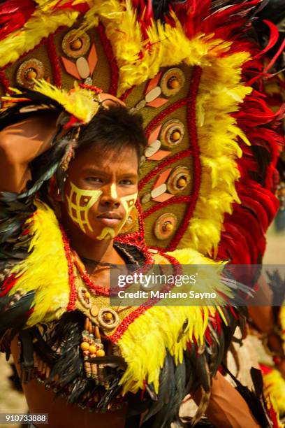 dinagyang tribesman at festival - dinagyang festival stock pictures, royalty-free photos & images