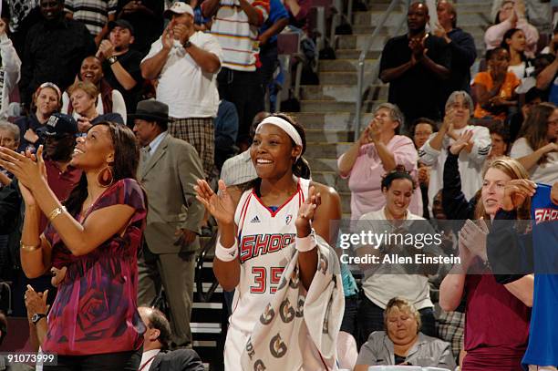 Cheryl Ford of the Detroit Shock cheers on her team from the sideline during a game against the Indiana Fever in Game One of the WNBA Eastern...