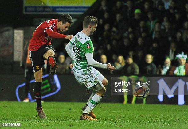 Manchester United's Spanish midfielder Ander Herrera scores the team's second goal during the FA Cup fourth round football match between Yeovil Town...