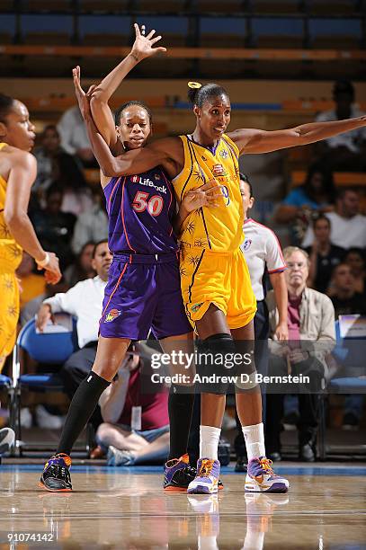 Lisa Leslie of the Los Angeles Sparks guards Tangela Smith of the Phoenix Mercury in Game One of the Western Conference Finals during the 2009 WNBA...