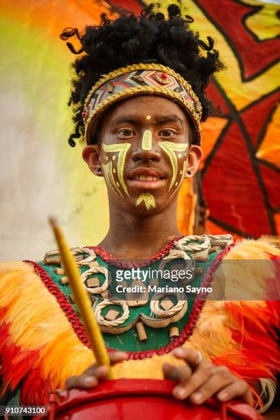 tribesman at festival - dinagyang festival stock pictures, royalty-free photos & images