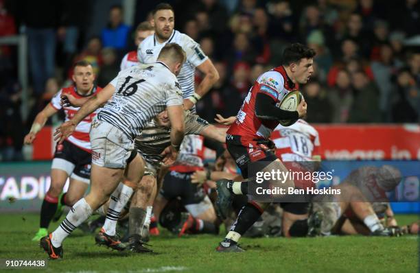 Matt Scott of Gloucester breaks through to score a second half try during the Anglo-Welsh Cup match between Gloucester Rugby and Ospreys at Kingsholm...