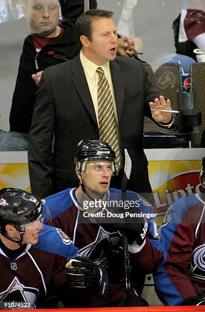 Head coach Joe Sacco of the Colorado Avalanche leads his team against the Los Angeles Kings during preseason NHL action at the Pepsi Center on...