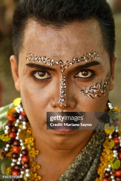 tribesman at festival - dinagyang festival stock pictures, royalty-free photos & images