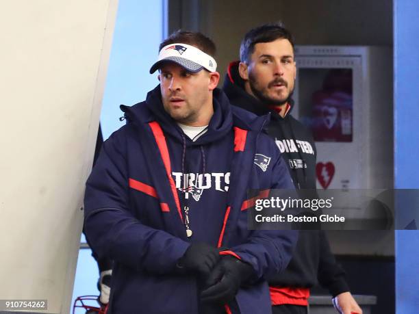 New England Patriots assistant coach Josh McDaniels, left, and Danny Amendola, right, arrive inside the practice bubble at Gillette Stadium in...