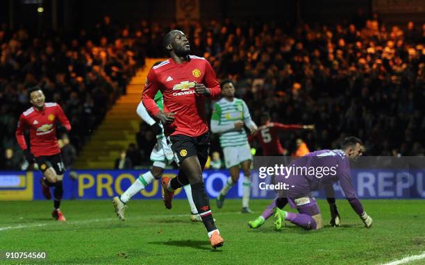 Manchester United's Belgian striker Romelu Lukaku reacts after scoring their fourth goal during the FA Cup fourth round football match between Yeovil...