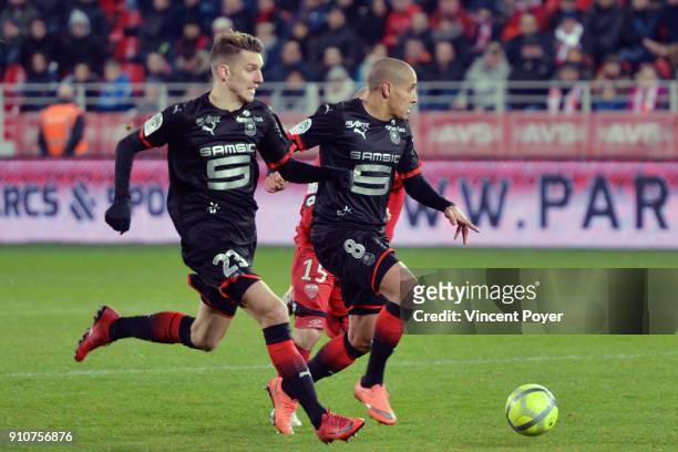 Adrien HUNOU and Wahbi KHAZRI of Rennes during the Ligue 1 match between Dijon FCO and Rennes at Stade Gaston Gerard on January 26, 2018 in Dijon, .