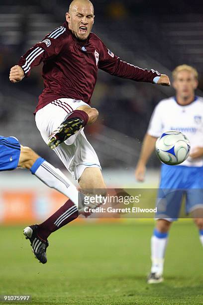 Conor Casey of the Colorado Rapids fights for the ball against the San Jose Earthquakes on September 23, 2009 at Dick's Sporting Goods Park in...
