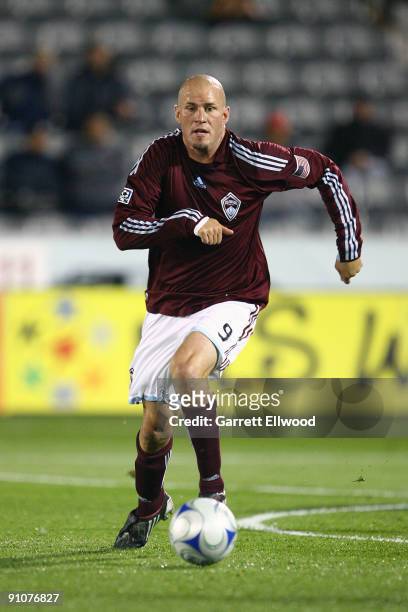 Conor Casey of the Colorado Rapids controls the ball against the San Jose Earthquakes on September 23, 2009 at Dick's Sporting Goods Park in Commerce...