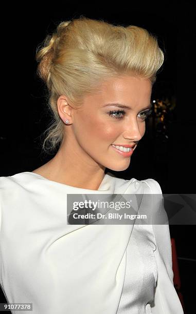 Actress Amber Heard arrives on the red carpet at the Los Angeles premiere of "Zombieland" at the Grauman's Chinese Theatre on September 23, 2009 in...