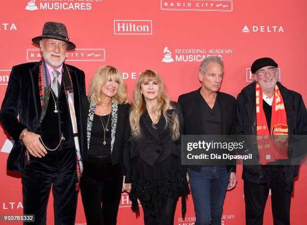 Honorees Mick Fleetwood, Christine McVie, Stevie Nicks, Lindsey Buckingham, and John McVie of music group Fleetwood Mac attend MusiCares Person of...