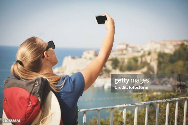 backpacker making selfie - ulcinj stock pictures, royalty-free photos & images