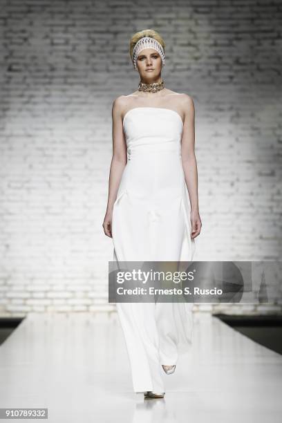 Model walks the runway at the Sabrina Persechino show during Altaroma on January 26, 2018 in Rome, Italy.