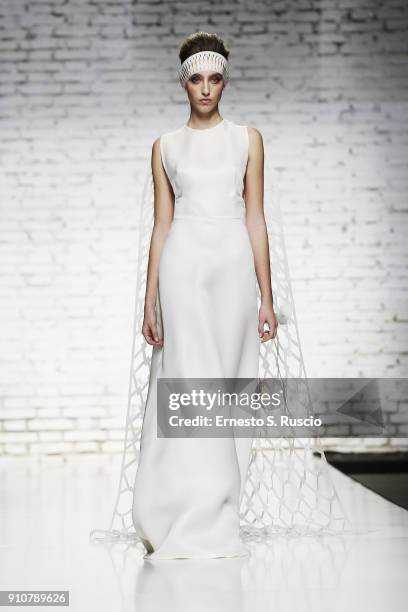 Model walks the runway at the Sabrina Persechino show during Altaroma on January 26, 2018 in Rome, Italy.